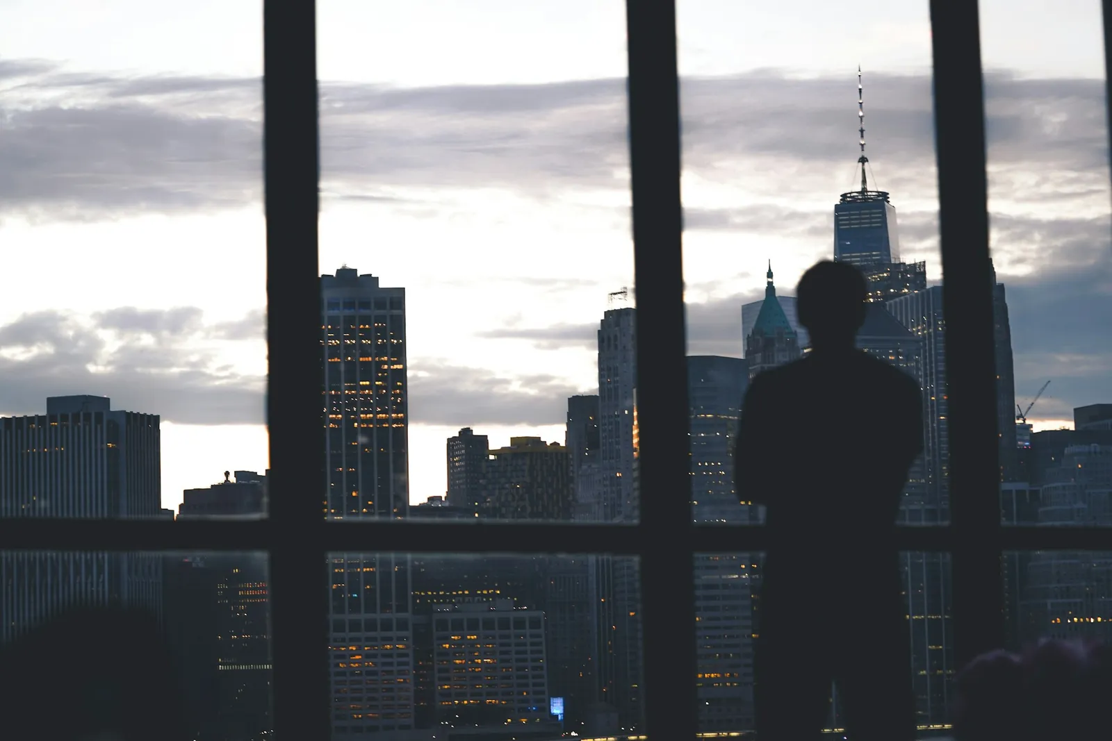 The silhouette of an executive working late